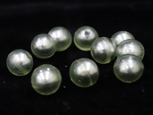 Polyurethane coated iron core grinding ball