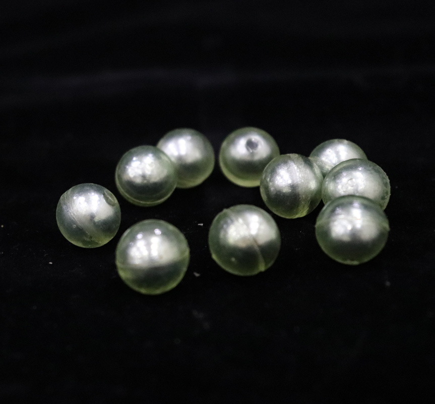 Polyurethane coated iron core grinding ball
